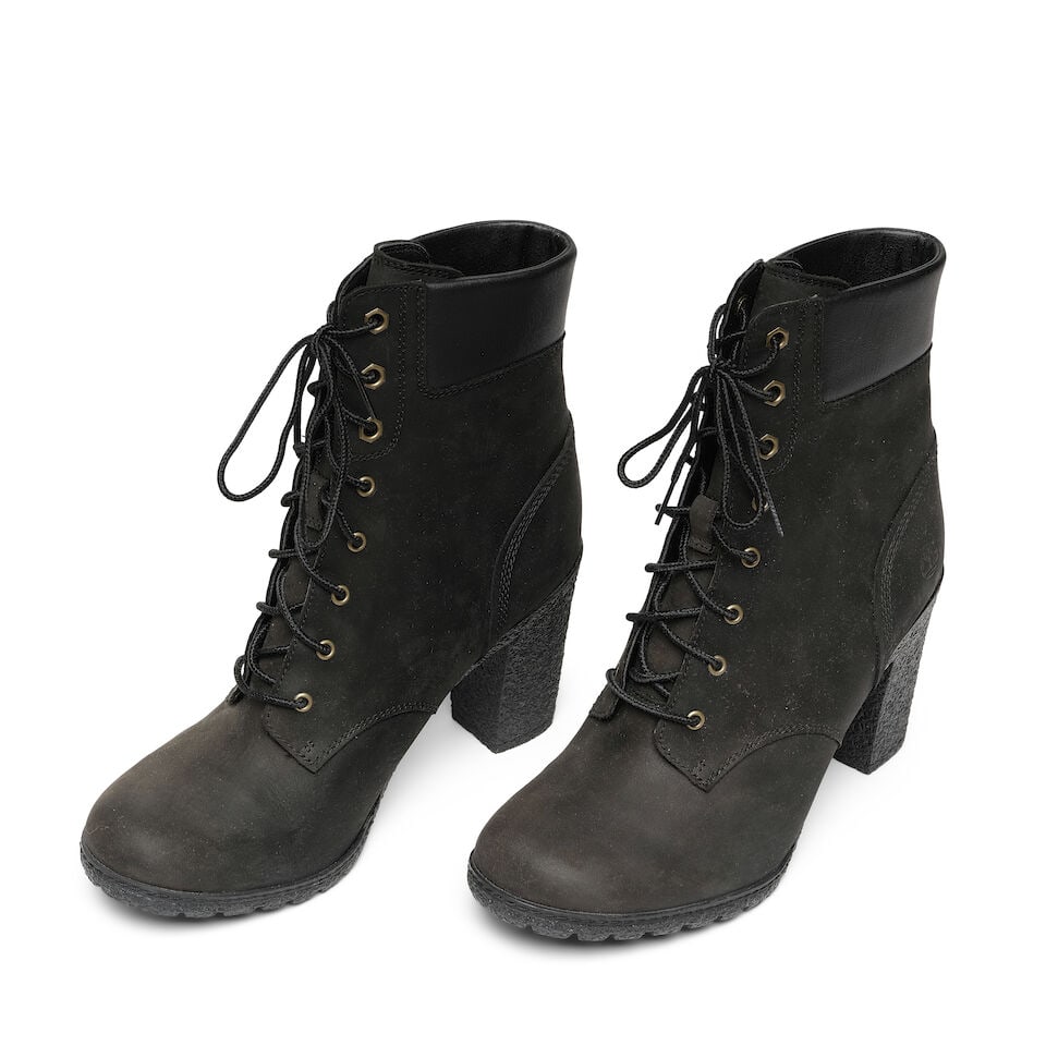 A PAIR OF TIMBERLAND BLACK LEATHER ALLINGTON MID BOOTS: A PAIR OF TIMBERLAND BLACK LEATHER ALLINGTON MID BOOTS Marked size 9 1/2. This lot is subject to the following lot symbols: ¤ ¤ Unless indicated by the ¤ symbol next to the lot number