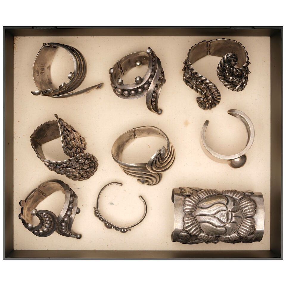A CURATED BOX OF NINE MEXICAN STERLING SILVER CUFF BRACELETS: A CURATED BOX OF NINE MEXICAN STERLING SILVER CUFF BRACELETS box height 4in; width 14in; depth 12in Footnotes: One featured in a photograph on @diane_keaton Instagram on 16 May 2016. This lot is subje