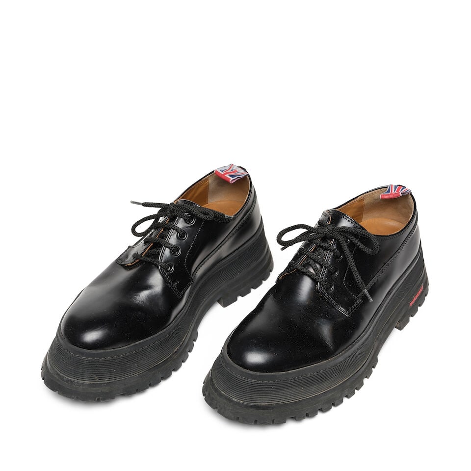 A PAIR OF BURBERRY BLACK LEATHER JEFFERSON CHUNKY DERBYS: A PAIR OF BURBERRY BLACK LEATHER JEFFERSON CHUNKY DERBYS No marked size. length 12 3/4in This lot is subject to the following lot symbols: ¤ ¤ Unless indicated by the ¤ symbol next to t