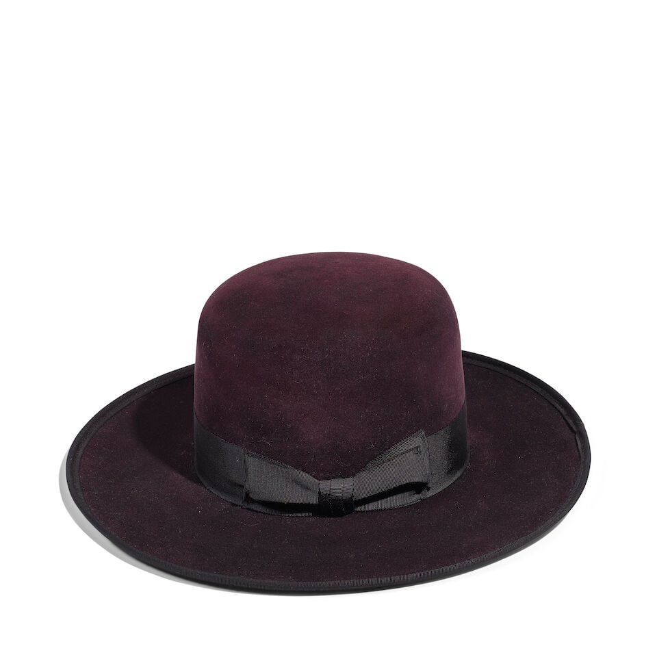 A CUSTOM NICK FOUQUET BLACK FELT WIDE HEAVY CURL BRIM HAT WITH RIBBON: A CUSTOM NICK FOUQUET BLACK FELT WIDE HEAVY CURL BRIM HAT WITH RIBBON No marked size. interior 8 x 6 1/2in Footnotes: Worn on multiple occasions. Also featured on @diane_keaton Instagram on 07 July 20