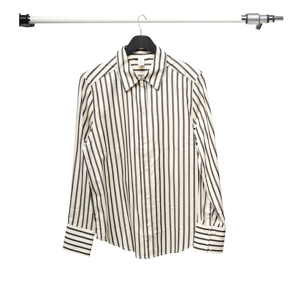 AN H&M BLACK AND WHITE STRIPED BUTTON-DOWN SHIRT, OAK BLACK LEATHER SKIRT, AND DONNA KAREN SKIRT - 5