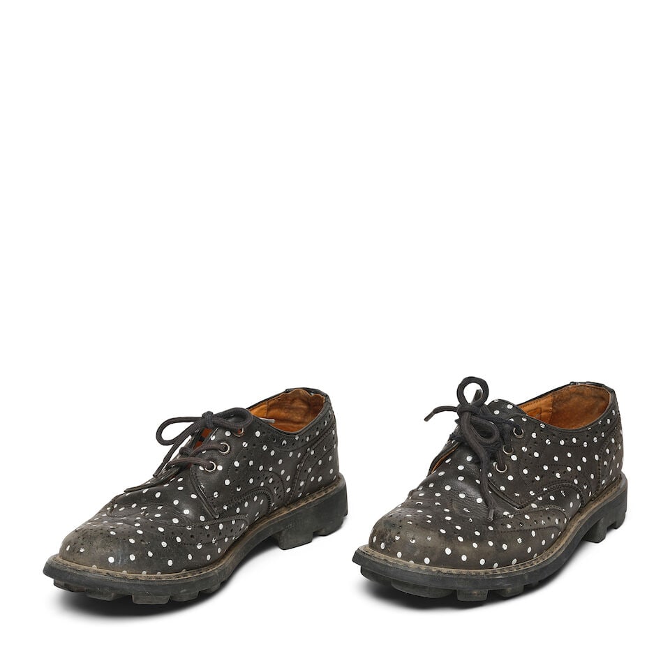 A PAIR OF JOHN FLUEVOG 7TH HEAVEN MICHAEL BLACK AND WHITE POLKA DOTA CLASSIC WING-TIPPED DERBY S...: A PAIR OF JOHN FLUEVOG 7TH HEAVEN MICHAEL BLACK AND WHITE POLKA DOTA CLASSIC WING-TIPPED DERBY SHOES Marked size W10. This lot is subject to the following lot symbols: ¤ ¤ Unless indicated b
