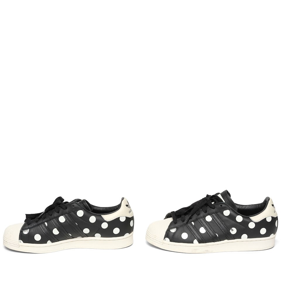 A PAIR OF ADIDAS BLACK AND WHITE LEATHER POLKA DOT SUPERSTAR SNEAKERSFall 2020 - 2