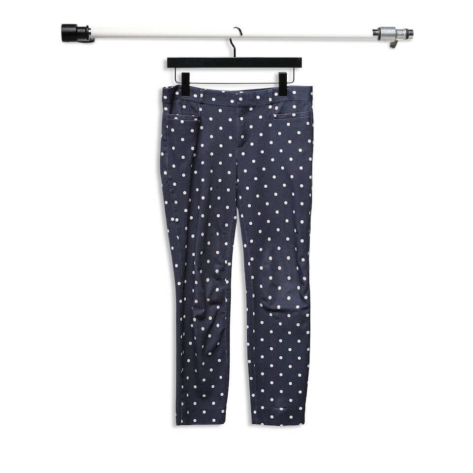 A GROUP OF BLUE AND WHITE POLKA DOT CLOTHING - 10
