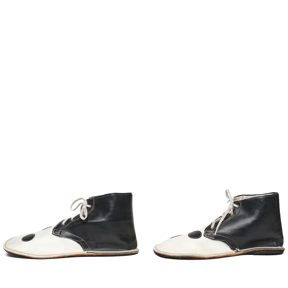 A PAIR OF BLACK AND WHITE CLOWN SHOES - 2