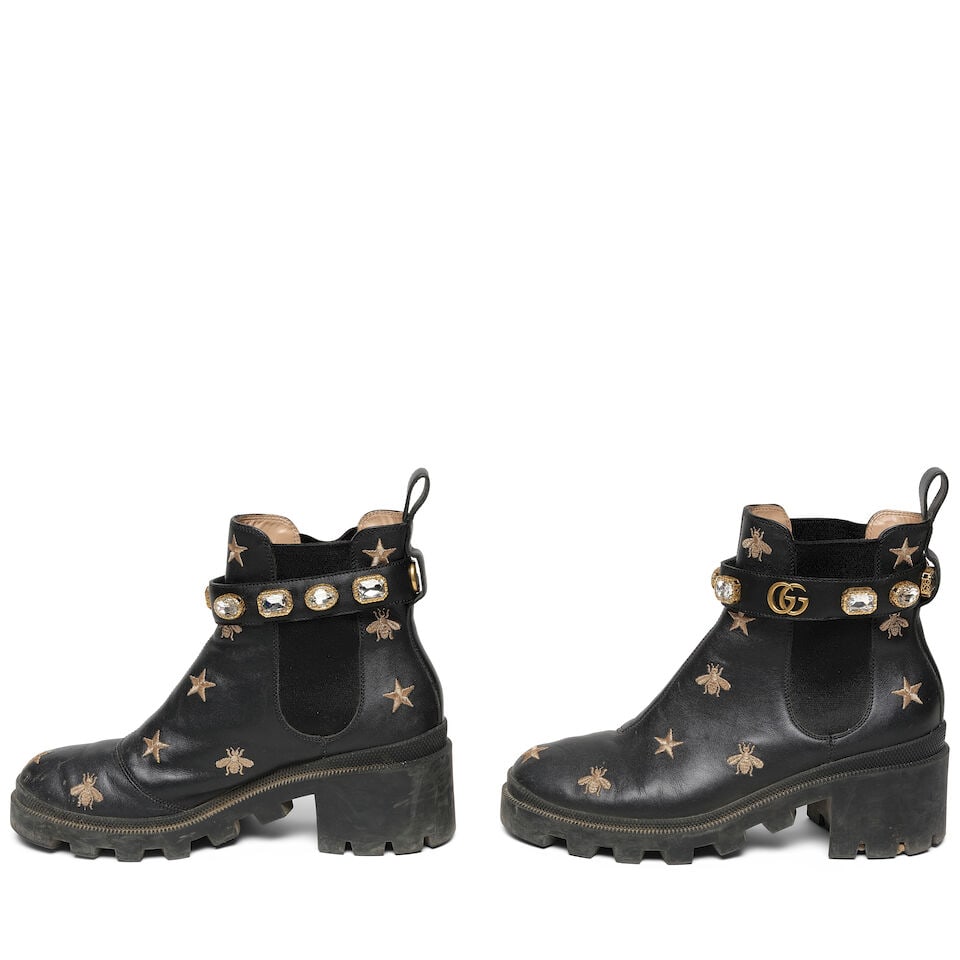 A PAIR OF GUCCI GOLD BEE AND STAR EMBROIDERED BLACK CALFSKIN LEATHER ANKLE BOOTS - 2
