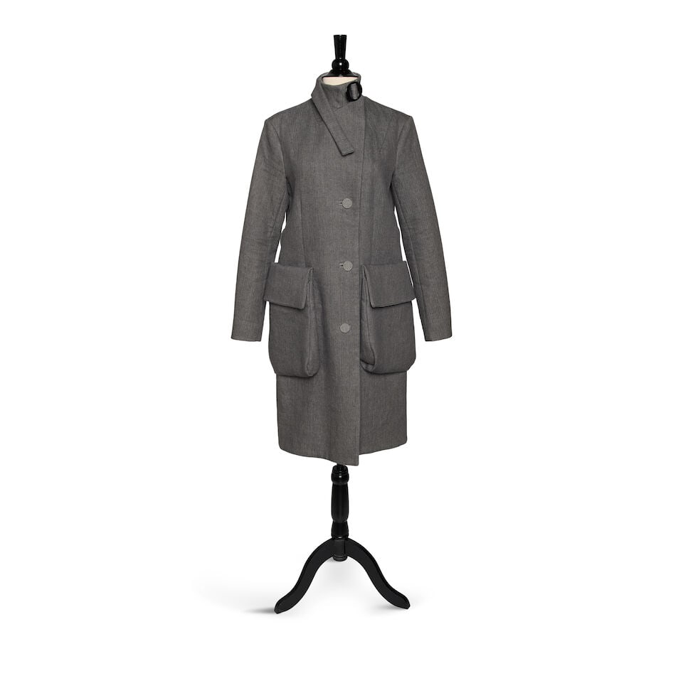 A MARNI GRAY WOOL BLEND BUTTON-DOWN COLLARED COAT: A MARNI GRAY WOOL BLEND BUTTON-DOWN COLLARED COAT Marked size 40. This lot is subject to the following lot symbols: ¤ ¤ Unless indicated by the ¤ symbol next to the lot number (or