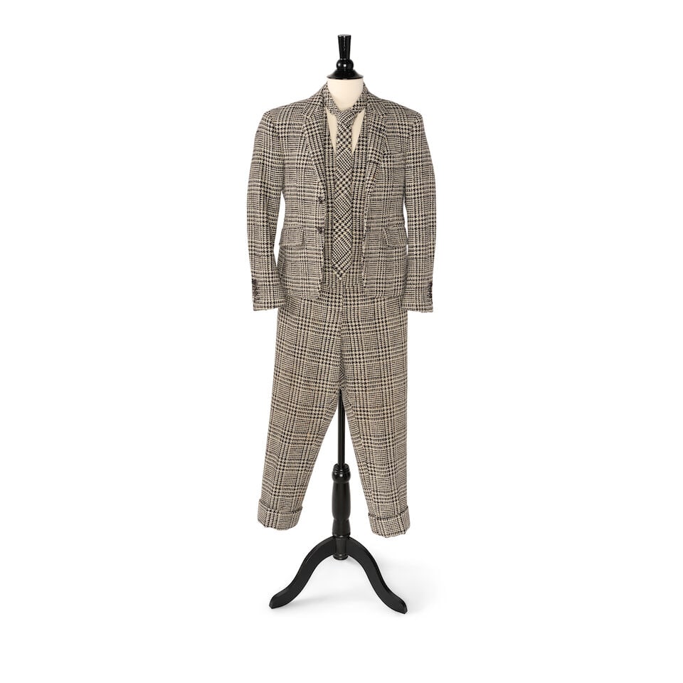 A CUSTOM THOM BROWNE FOUR-PIECE HOUNDSTOOTH SUIT2014: A CUSTOM THOM BROWNE FOUR-PIECE HOUNDSTOOTH SUIT 2014 Comprising a single-breasted blazer with an interior tag inscribed DIANE KEATON / MADE IN JAPAN / SIZE 00. / 24.JAN.2014, a necktie with a tag ins