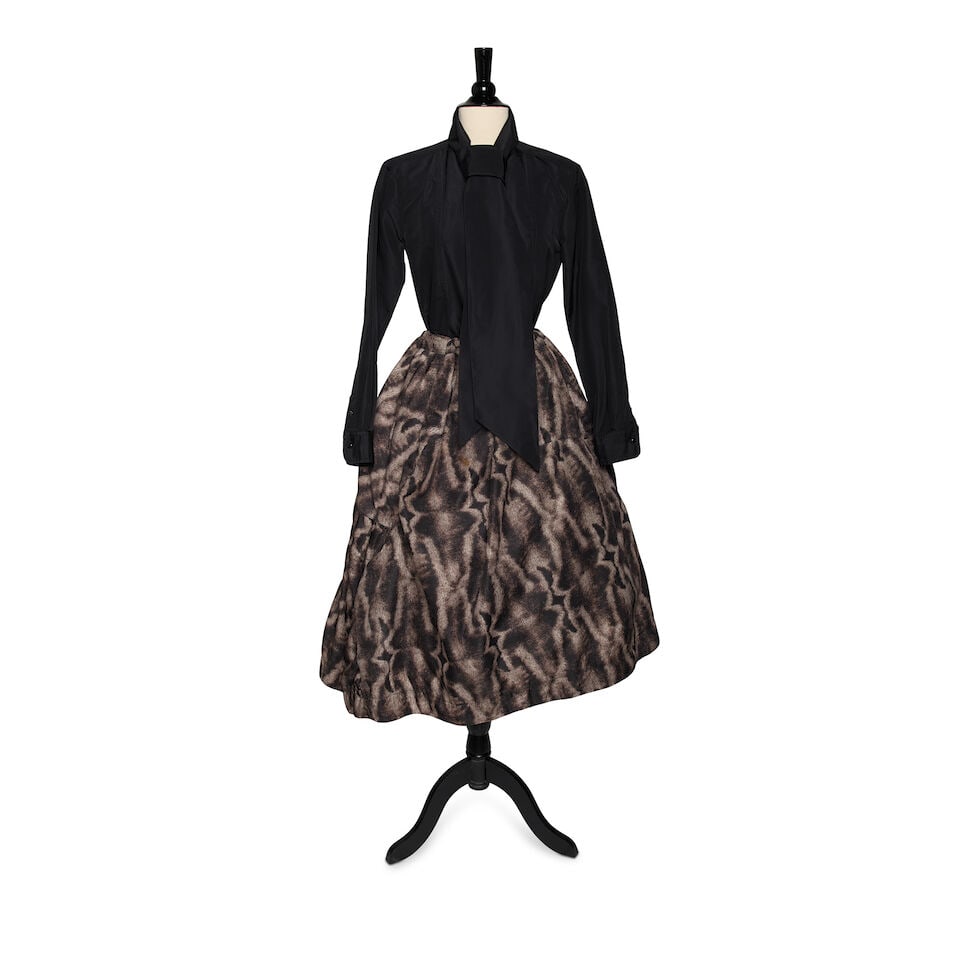A COMME DES GARÇONS MUTED BROWN AND BEIGE FUR PRINT SKIRT: A COMME DES GARÇONS MUTED BROWN AND BEIGE FUR PRINT SKIRT Marked size XS, together with an unmarked black layered tulle skirt and a Ralph Lauren Purple Label black lavallière button-down shi