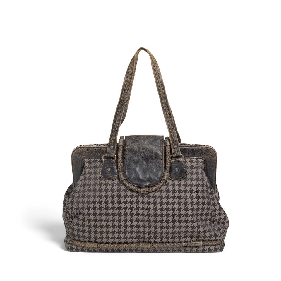 AN INDUSTRY FAUX LEATHER AND BLACK AND WHITE HOUNDSTOOTH HANDBAG: AN INDUSTRY FAUX LEATHER AND BLACK AND WHITE HOUNDSTOOTH HANDBAG height 14 5/8in; width 16in; shoulder drop 9 1/4in This lot is subject to the following lot symbols: ¤ ¤ Unless indicated by