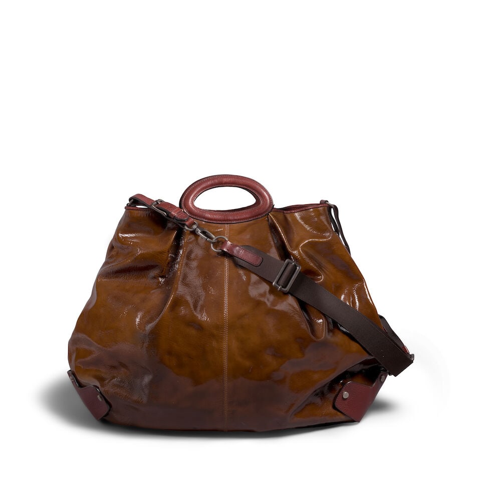 A MARNI BROWN PATENT LEATHER BAG: A MARNI BROWN PATENT LEATHER BAG height 21 1/2in; width 20in; shoulder drop 18in This lot is subject to the following lot symbols: ¤ ¤ Unless indicated by the ¤ symbol next to the lot