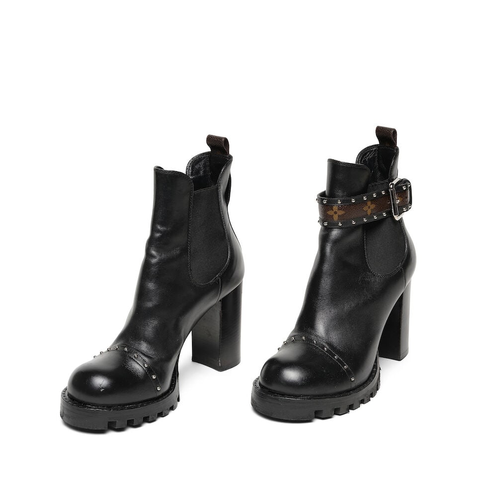 A PAIR OF LOUIS VUITTON SILVER STUDDED BLACK LEATHER COMBAT BOOTS (1 of 3)