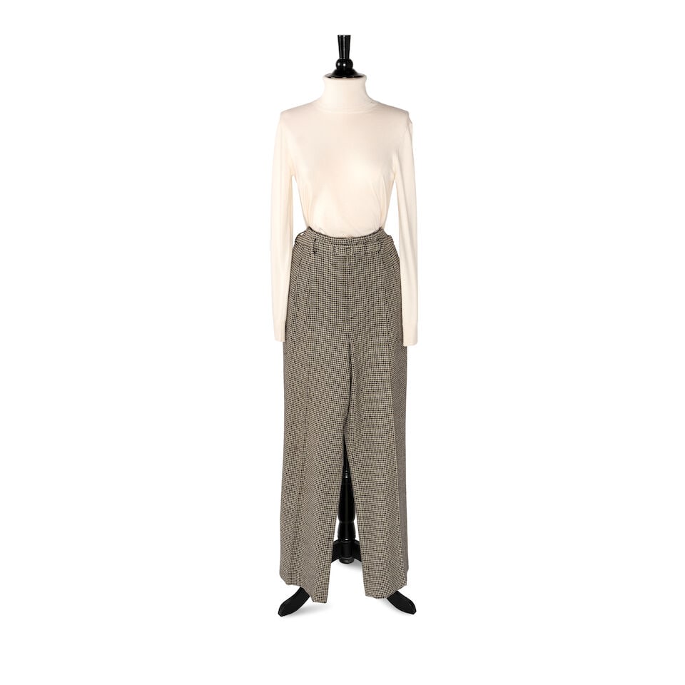 A RALPH LAUREN OUTFIT: A RALPH LAUREN OUTFIT Comprising a cream cashmere turtleneck sweater marked size S/P and a pair of belted Purple Label houndstooth pants with no marked size. (2) waist approximately 28in This lot is
