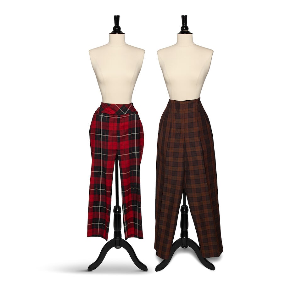 TWO PAIRS OF PLAID PANTS: TWO PAIRS OF PLAID PANTS Comprising a pair of Forever 21 red plaid pants marked size 7 and a pair of Margaret Howell brown linen blend trousers marked size 8. This lot is subject to the following lot