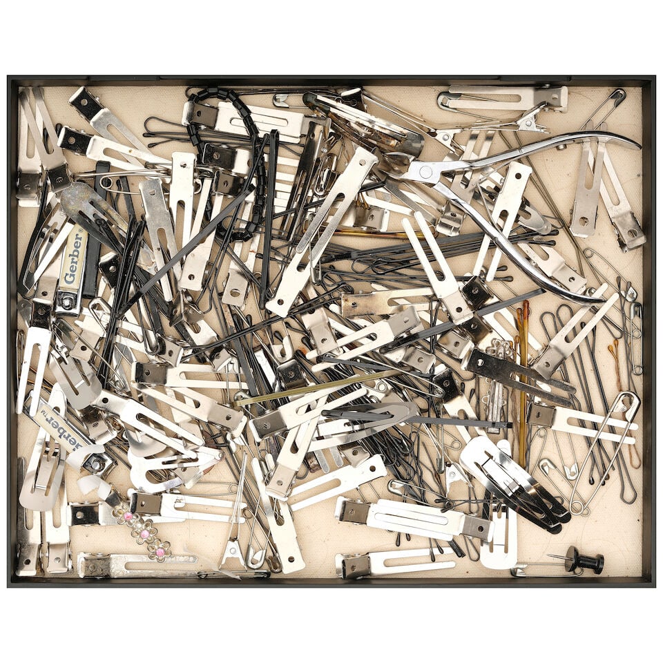 A CURATED BOX OF HAIR PINS, SAFETY PINS, AND NAIL CLIPPERS: A CURATED BOX OF HAIR PINS, SAFETY PINS, AND NAIL CLIPPERS height of box 2in; width 11 1/2in; depth 9 1/4in This lot is subject to the following lot symbols: ¤ ¤ Unless indicated by the