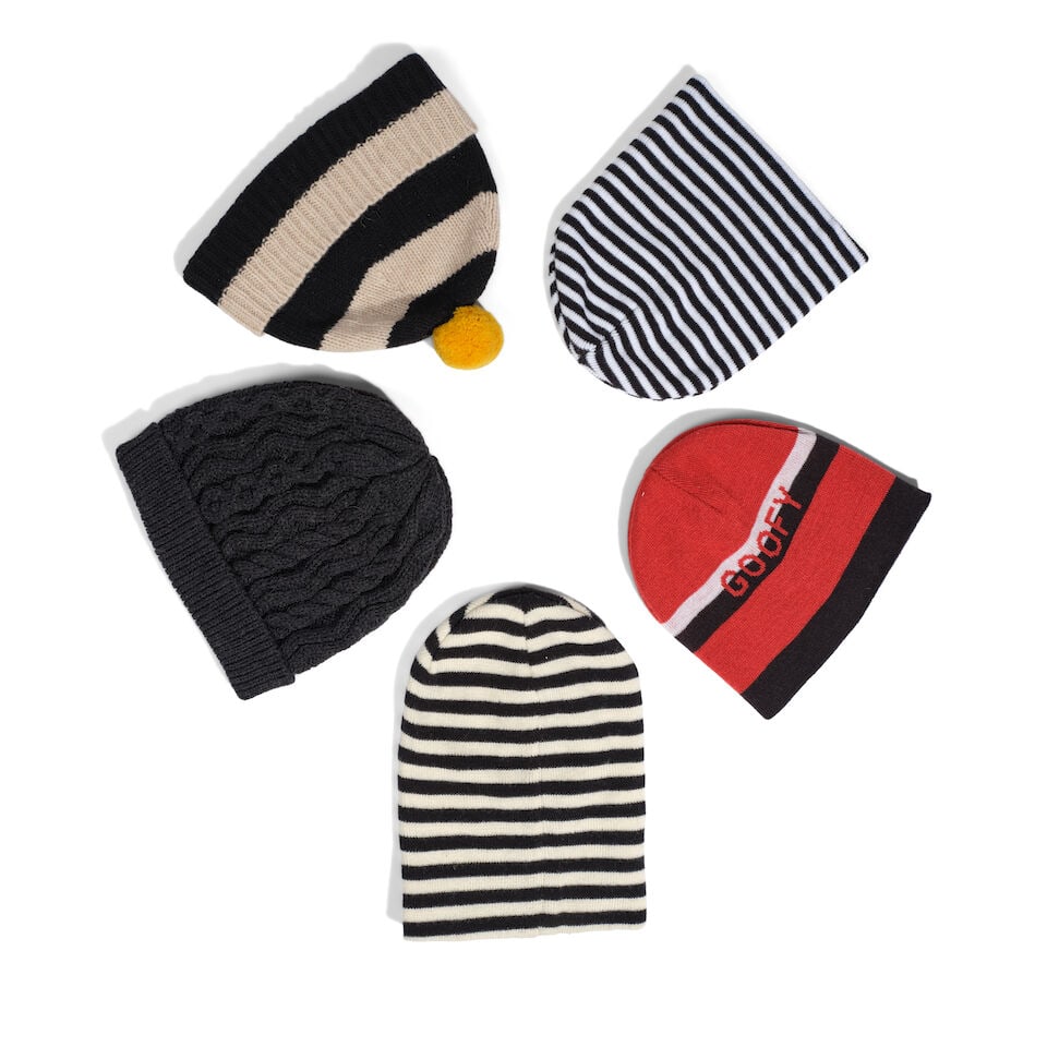FIVE KNIT BEANIES: FIVE KNIT BEANIES Various patterns, materials, and makers, including Thom Browne, one marked size M. Footnotes: The black knit beanie worn in the GHOST music video with Justin Bieber, 2021. This lot