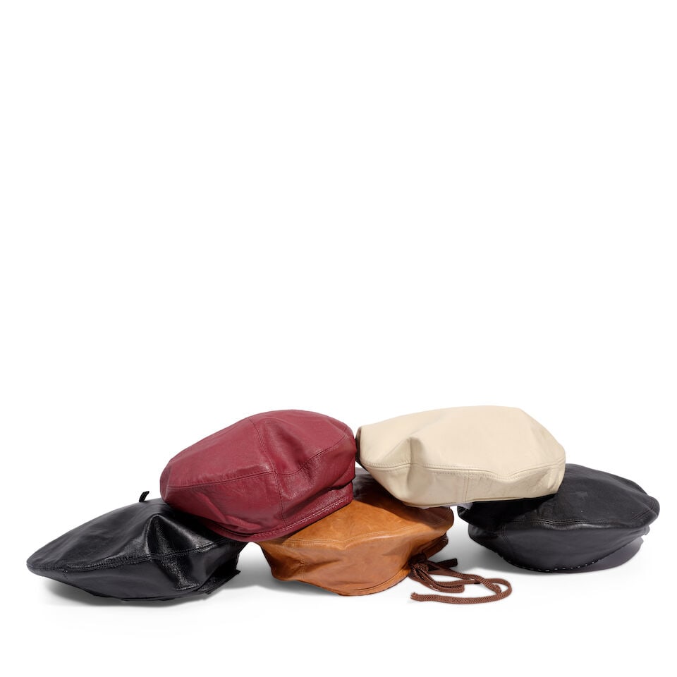FIVE LEATHER BERETS: FIVE LEATHER BERETS Various colors and makers, one marked size small, one marked one size. This lot is subject to the following lot symbols: ¤ ¤ Unless indicated by the ¤ symbol next to