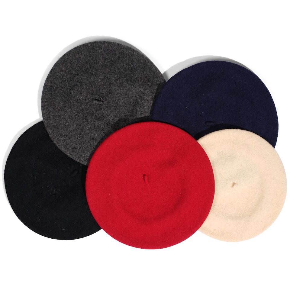 FIVE WOOL BERETS: FIVE WOOL BERETS Various colors and makers, one marked one size. This lot is subject to the following lot symbols: ¤ ¤ Unless indicated by the ¤ symbol next to the lot number (or bearin