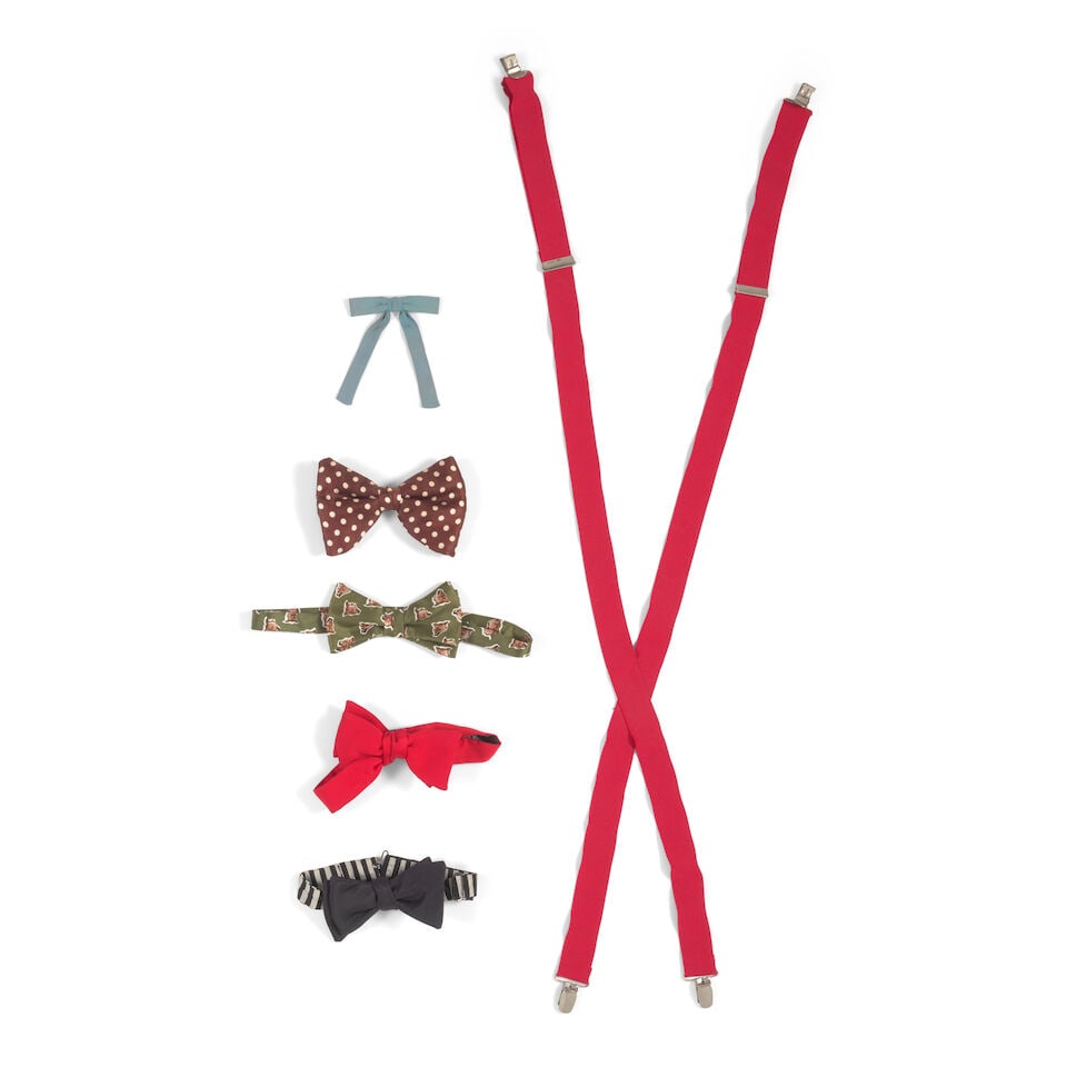FIVE VINTAGE PRE-TIED BOWTIES AND A PAIR OF RED SUSPENDERS: FIVE VINTAGE PRE-TIED BOWTIES AND A PAIR OF RED SUSPENDERS Two clip on examples and three adjustable examples, all various materials and patterns. Footnotes: The black bowtie worn to the premiere of U