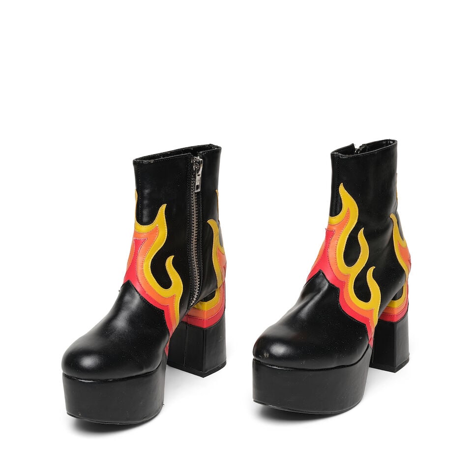 A PAIR OF CURRENT MOOD FAUX LEATHER 'BURNER' PLATFORM BOOTSRetailed by Dolls Kill: A PAIR OF CURRENT MOOD FAUX LEATHER 'BURNER' PLATFORM BOOTS Retailed by Dolls Kill Marked size 10M. Footnotes: Worn on The Ellen DeGeneres Show in February 2019 and featured on @diane_keaton