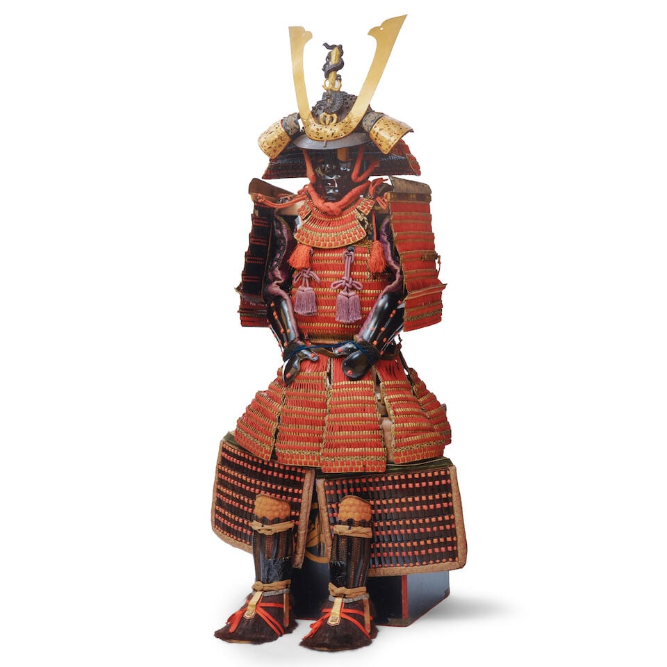 AN ORANGE-LACED GOLD-LACQUER ARMOR WITH A MYŌCHIN-LINEAGE HELMET Edo period (1615-1868), 18...: AN ORANGE-LACED GOLD-LACQUER ARMOR WITH A MYŌCHIN-LINEAGE HELMET Edo period (1615-1868), 18th/19th century Lacquered gold and laced entirely in orange comprising a 16-plate russet-iron