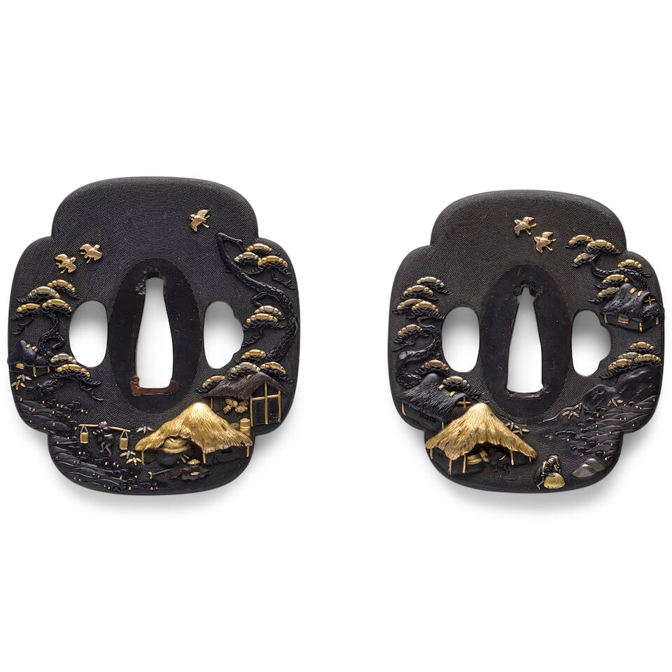 A SHAKUDŌ DAISHO (PAIR OF HANDGUARDS) Edo period (1615-1868), 18th/19th century (2): A SHAKUDŌ DAISHO (PAIR OF HANDGUARDS) Edo period (1615-1868), 18th/19th century Of mokkō form with a nanako ground, chiseled and inlaid of gold and silver with scenes of salt makers working 
