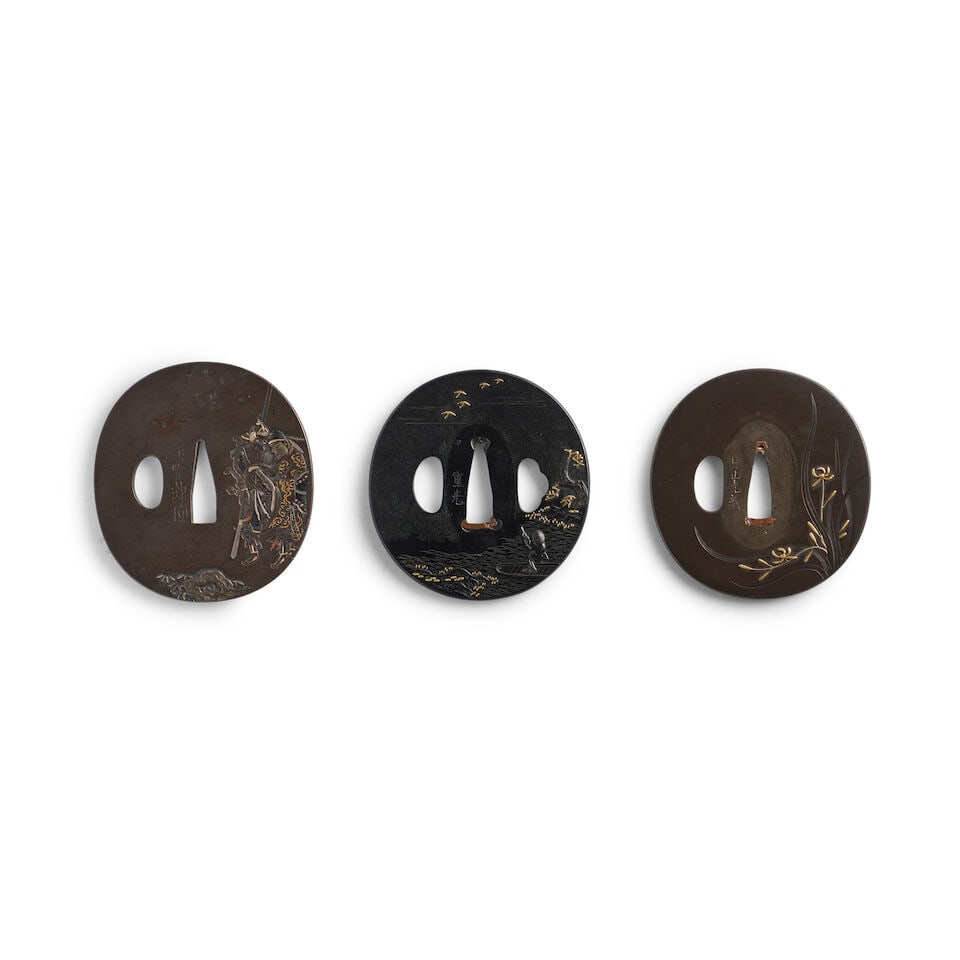 THREE MIXED-METAL TSUBA (HAND GUARDS) Edo period (1615-1868), 19th century (3): THREE MIXED-METAL TSUBA (HAND GUARDS) Edo period (1615-1868), 19th century Comprising a Hamano-school oval shakudō migakiji tsuba chiseled in sunken and low relief and inlaid in gold and copper w