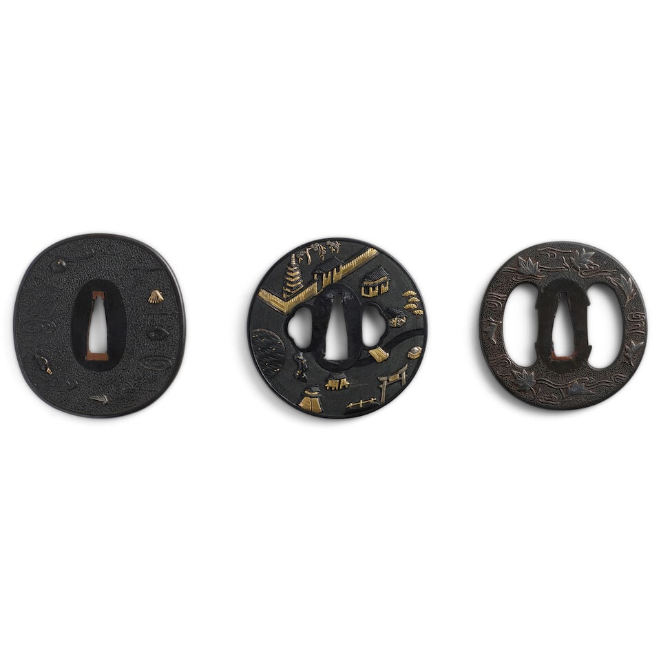 THREE KO-KINKŌ SHAKUDŌ TSUBA (HAND GUARDS) Edo period (1615-1868), 19th century (3): THREE KO-KINKŌ SHAKUDŌ TSUBA (HAND GUARDS) Edo period (1615-1868), 19th century Comprising an oval tsuba with a raised rim and a bold ishimeji ground decorated in iro-e takazōgan with