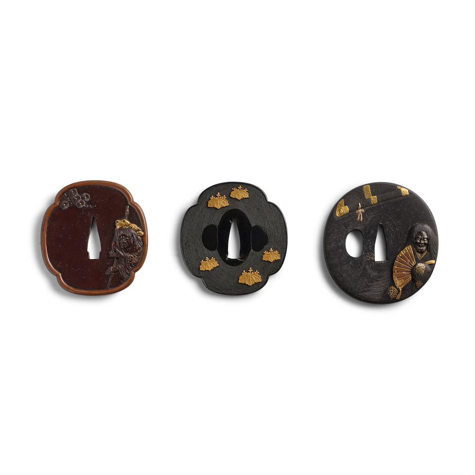 TWO INLAID-IRON TSUBA (HAND GUARDS) AND A SHAKUDŌ TSUBA Edo period (1615-1868) or Meiji era...: TWO INLAID-IRON TSUBA (HAND GUARDS) AND A SHAKUDŌ TSUBA Edo period (1615-1868) or Meiji era (1868-1912), 19th century Comprising a mokkō iron tsuchimeji tsuba fitted with broad copper rim an