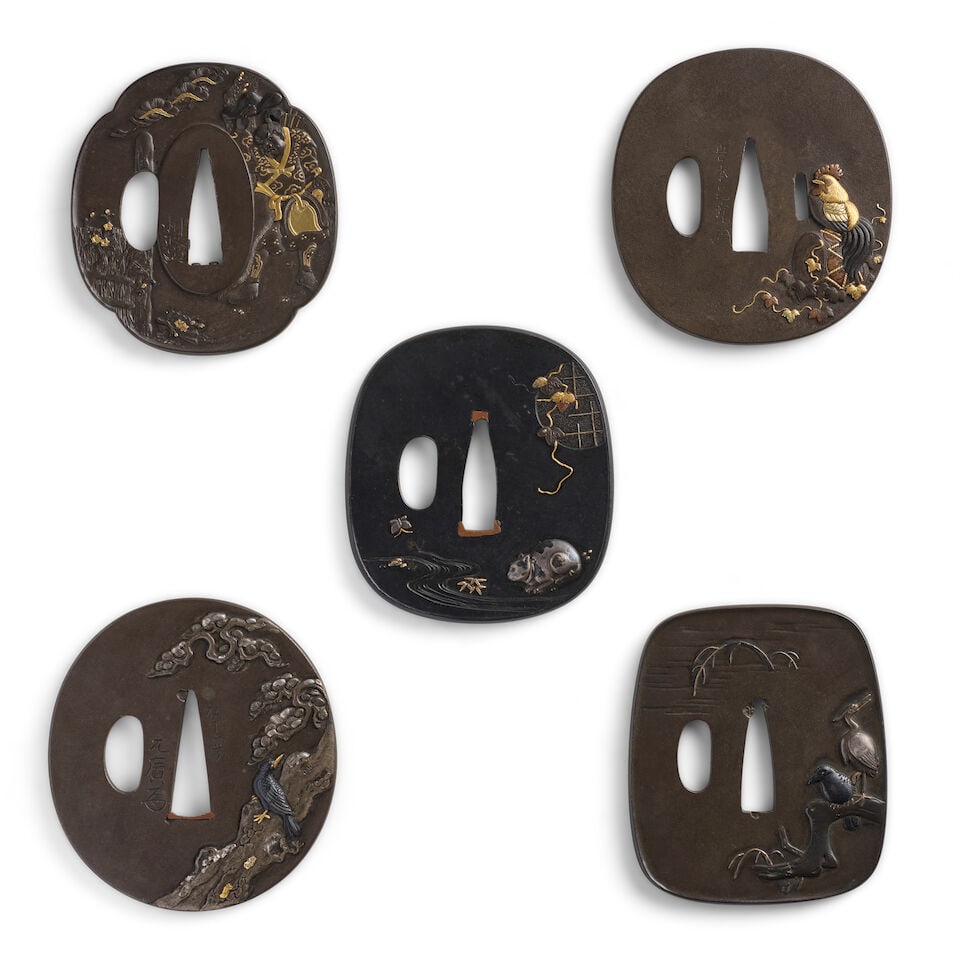 FIVE MIXED-METAL TSUBA (HAND GUARDS) Edo period (1615-1868) or Meiji era (1868-1912), 19th centu...: FIVE MIXED-METAL TSUBA (HAND GUARDS) Edo period (1615-1868) or Meiji era (1868-1912), 19th century Comprising a mokkō shibuichi migakiji tsuba chiseled in relief and with details in gold depictin