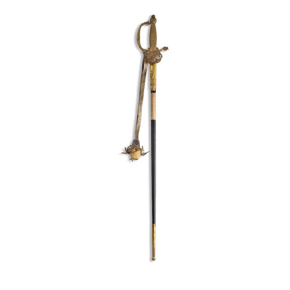A DIPLOMAT SWORD Showa era (1926-1989), mid-20th century: A DIPLOMAT SWORD Showa era (1926-1989), mid-20th century The rapier of diamond section and chiseled with parallel bohi on both sides, the saya lacquered black and mounted with gilt metal fittings chis