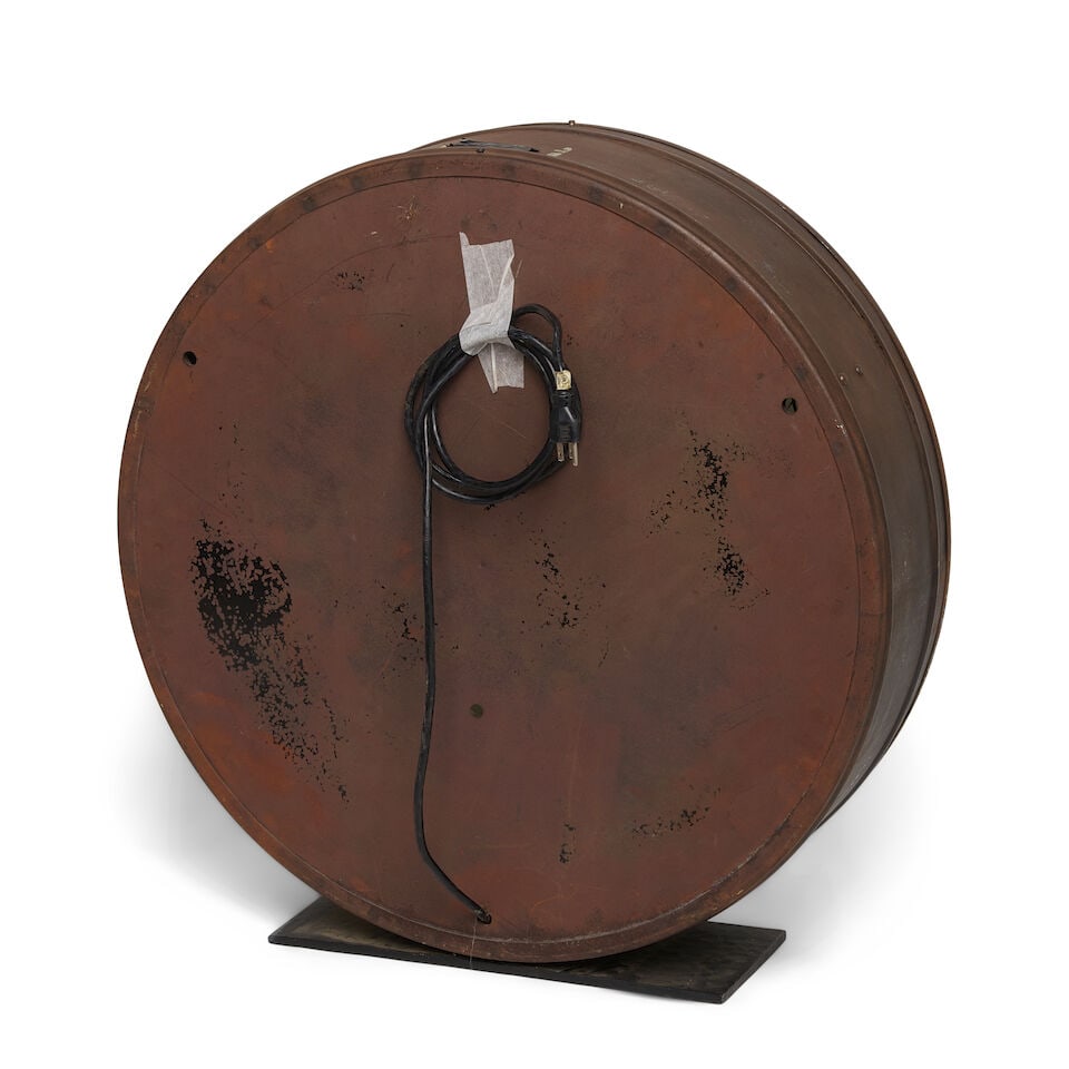 A LARGE METAL CLOCK - 2