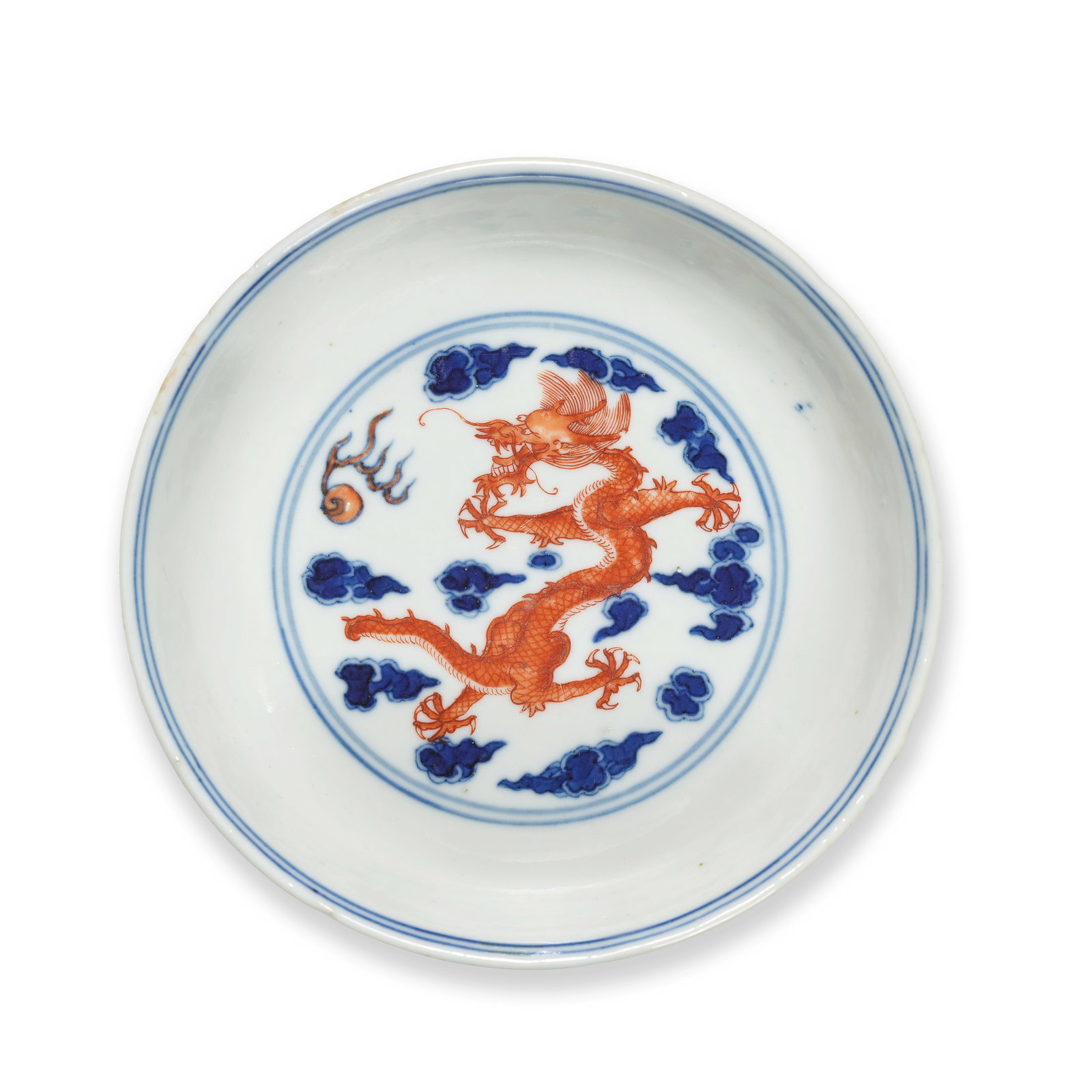 AN UNDERGLAZE BLUE AND IRON RED 'DRAGON' DISH Jingjin tang four-character mark, 19th century: AN UNDERGLAZE BLUE AND IRON RED 'DRAGON' DISH Jingjin tang four-character mark, 19th century Enamelled to the interior in iron red with a leaping five-clawed dragon reaching for a flaming pearl amidst
