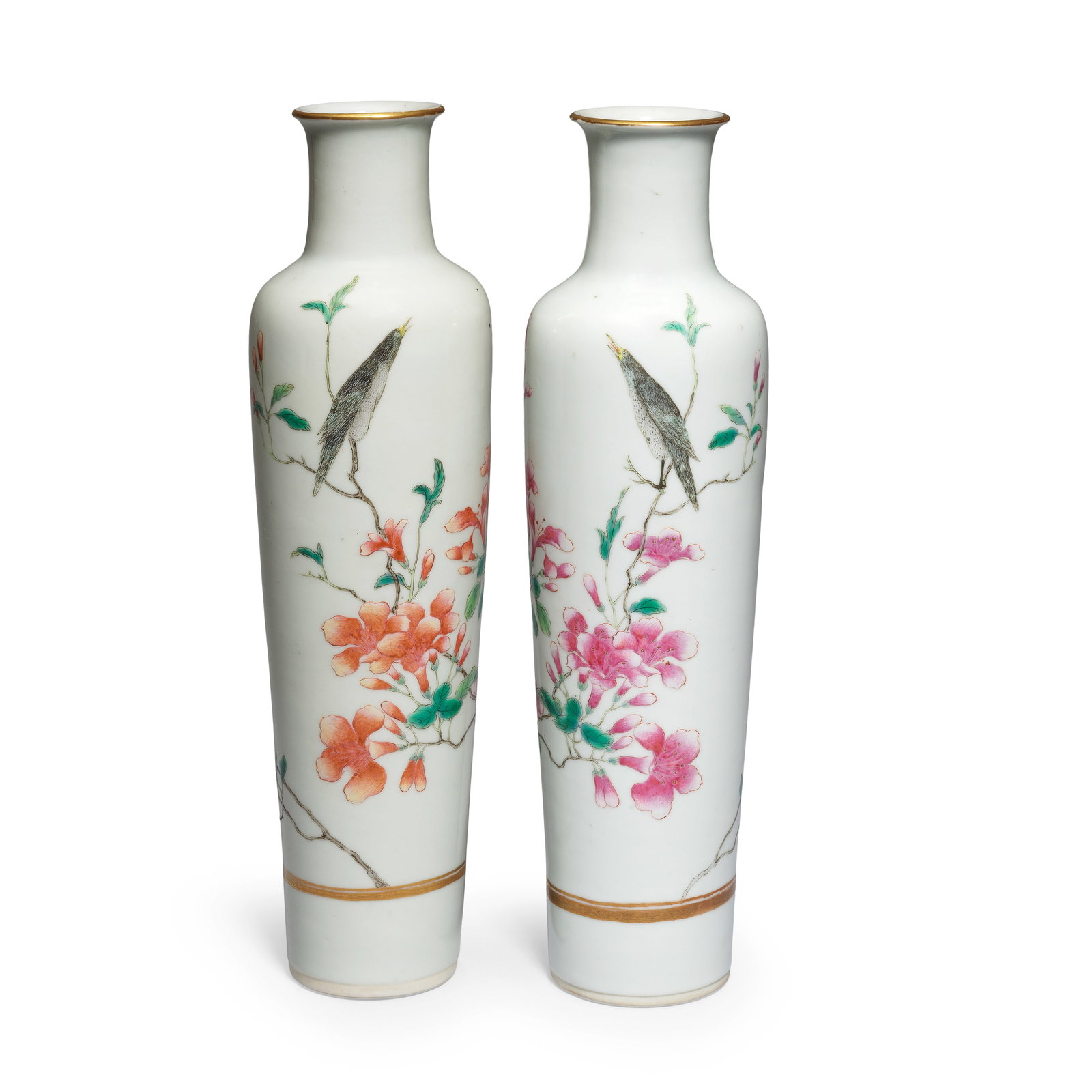 A PAIR OF FAMILLE ROSE 'BIRD AND FLOWER' VASES Republic period (2): A PAIR OF FAMILLE ROSE 'BIRD AND FLOWER' VASES Republic period Of tapered cylindrical form with cylindrical necks and everted gilt rims, enamelled in mirror image with a bird on magnolia branches, the