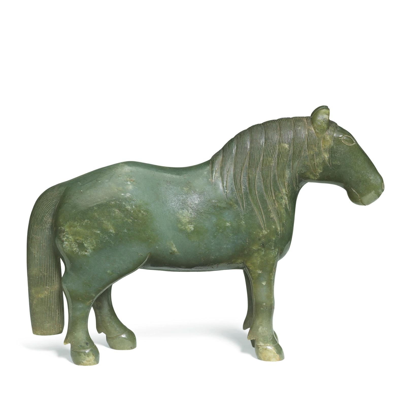 A SPINACH JADE MODEL OF A HORSE Qing Dynasty: A SPINACH JADE MODEL OF A HORSE Qing Dynasty Naturalistically carved, standing foursquare, facing forwards, with finely incised mane and tail, the face with almond shaped eyes and pricked ears, the sp