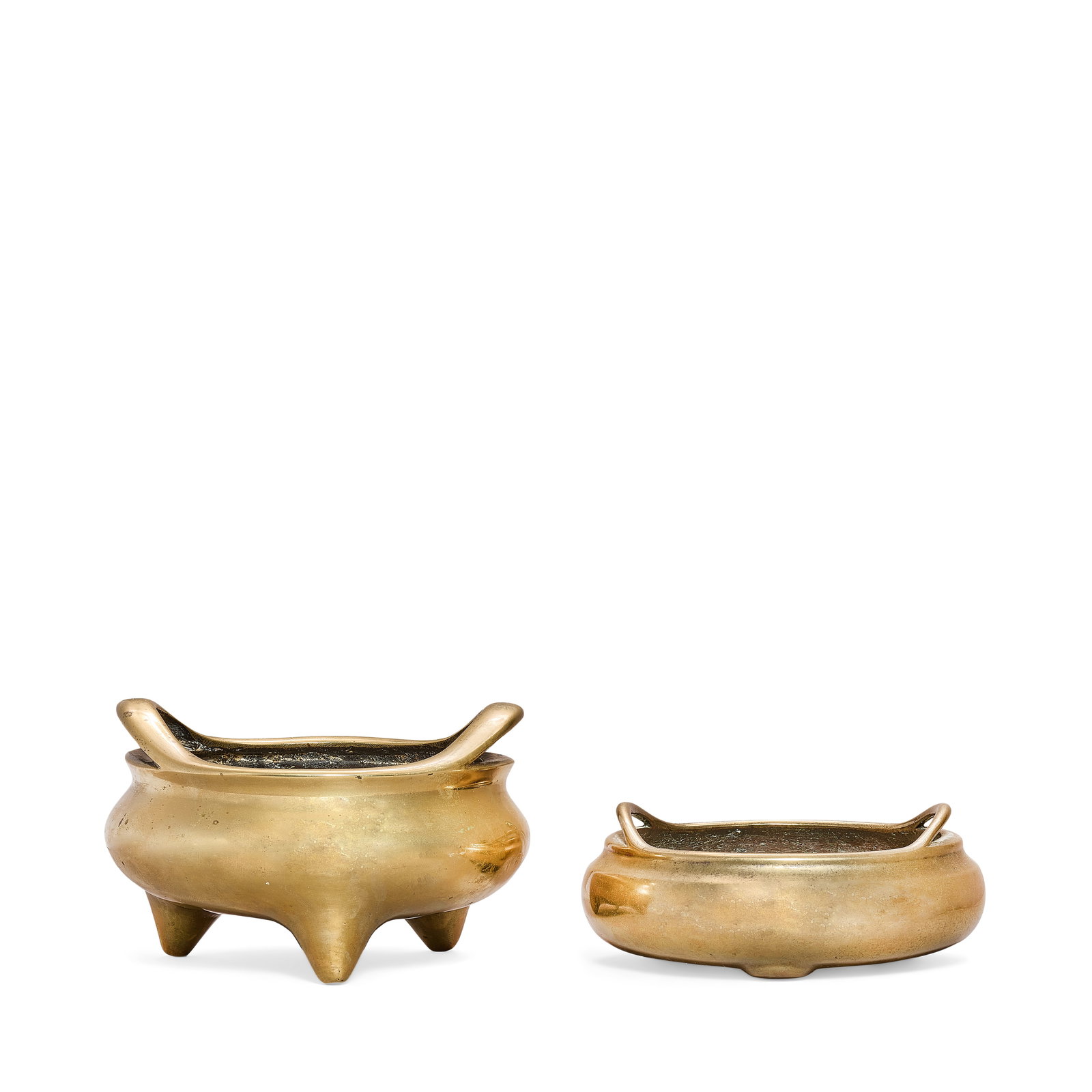 TWO BRONZE INCENSE BURNERS Xuande sixteen-character mark, signed Wu Bangzuo; Xuande six-characte...: TWO BRONZE INCENSE BURNERS Xuande sixteen-character mark, signed Wu Bangzuo; Xuande six-character mark, Qing Dynasty Each of bombé -form, supported on tripod feet, with a loop handle emerging fro