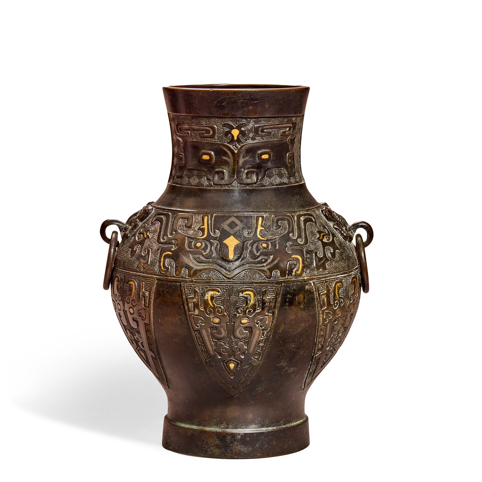 A GOLD AND SILVER INLAID ARCHAISTIC BRONZE VASE, HU 18th century: A GOLD AND SILVER INLAID ARCHAISTIC BRONZE VASE, HU 18th century Of baluster form, set with a pair of taotie mask and loose ring handles, cast in low relief to the neck and upper body with wide bands 