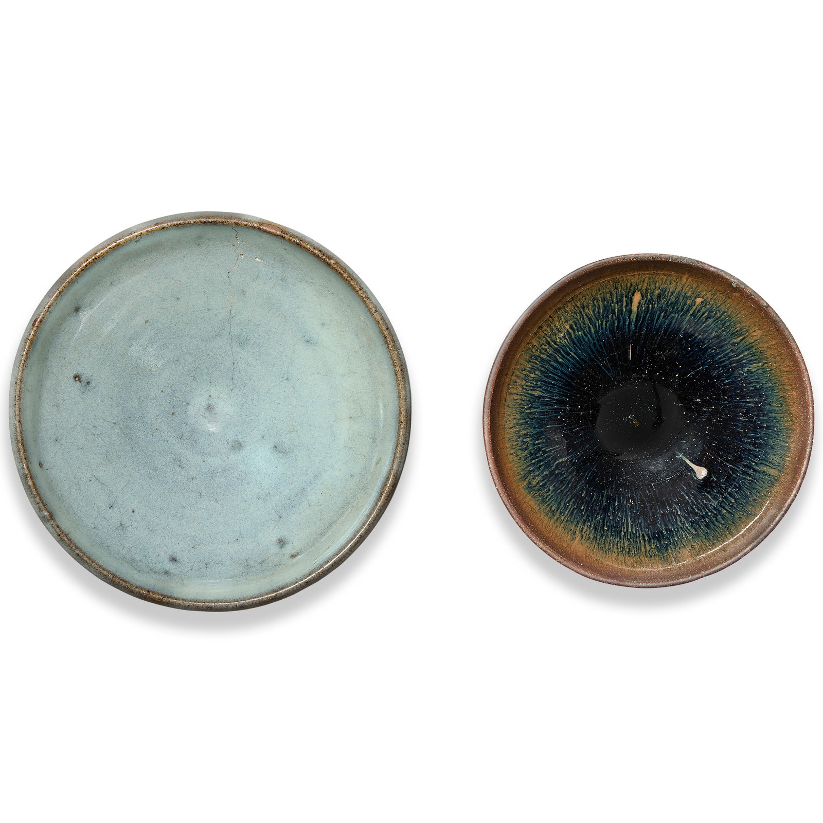 A JIANYAO 'HARE'S FUR' BOWL AND A JUNYAO BOWL Song Dynasty (2): A JIANYAO 'HARE'S FUR' BOWL AND A JUNYAO BOWL Song Dynasty Comprising: a Jian 'hare's fur' bowl, potted with rounded sides rising from a short foot, covered inside and out with a lustrous black glaze 