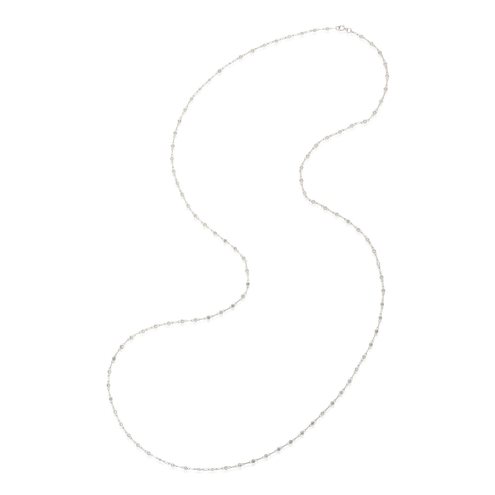 A PLATINUM AND DIAMOND CHAIN: A PLATINUM AND DIAMOND CHAIN With bezel-set full-cut diamonds, approximate total weight 4.00 carats, weight 4.0 dwt, length 39 in. For further information on this lot please visit Bonhams.com