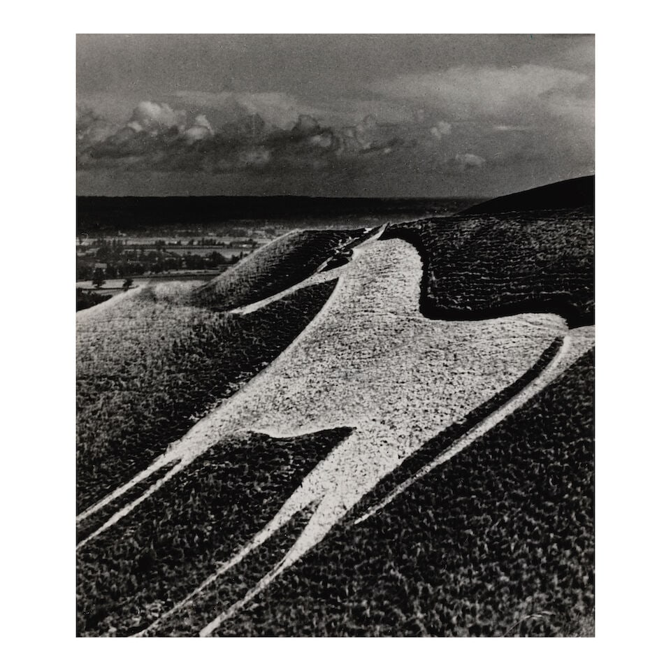 Bill Brandt (1904-1983); 'The White Horse, Westbury, Southern England';: Bill Brandt (1904-1983) 'The White Horse, Westbury, Southern England', 1946 Gelatin silver print; titled in ink, the photographer's credit stamp, and a Rapho Guillumette photo agency stamp on the reve