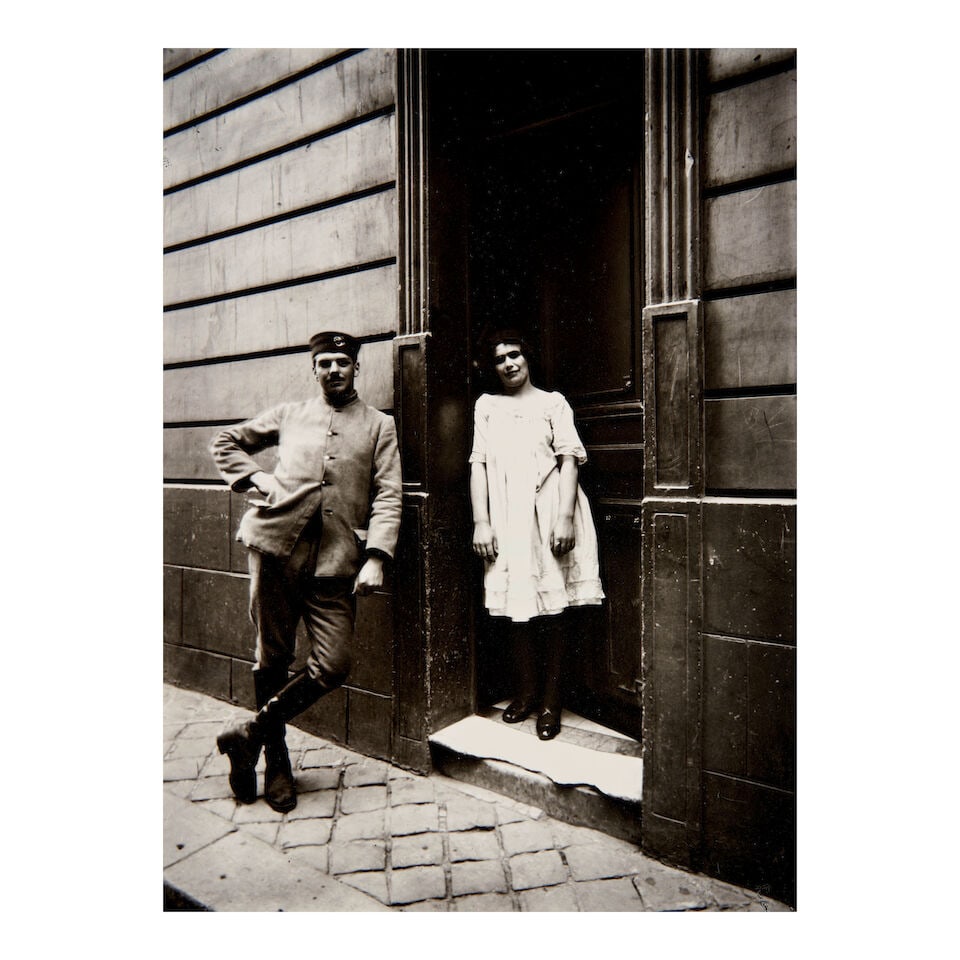 Eugène Atget (1857-1927); Versailles, femme et soldat, maison close; (1 of 2)