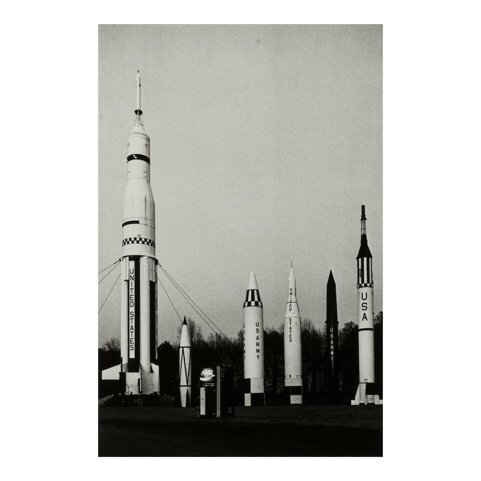 Elliott Erwitt (1928-2023); Air and Space Museum, Huntsville, Alabama;: Elliott Erwitt (1928-2023) Air and Space Museum, Huntsville, Alabama, 1974 Gelatin silver print; signed in pencil on the reverse, framed. 12 1/8 x 8 1/4 in. (30.8 x 20.9 cm) sheet 13 7/8 x 11 in. (35.