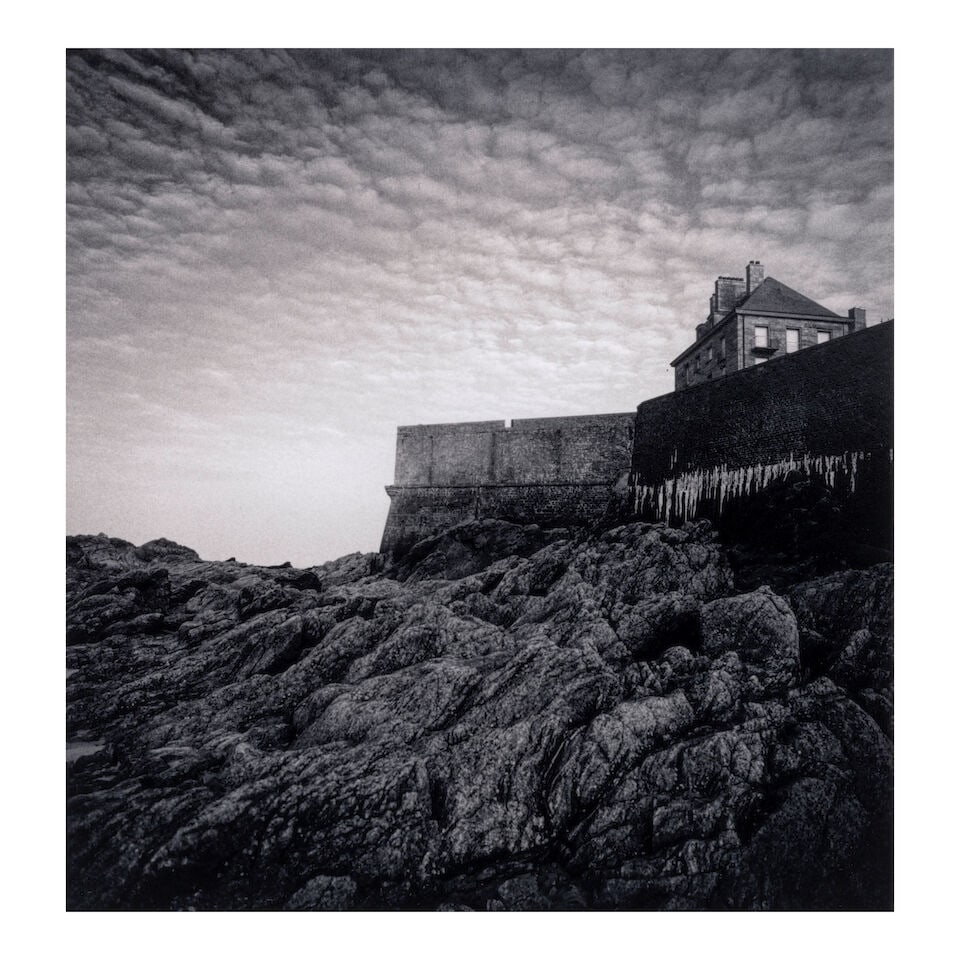 Michael Kenna (born 1953); 'Shuttered Building, St Malo, France';: Michael Kenna (born 1953) 'Shuttered Building, St Malo, France', 1993 Sepia-toned gelatin silver print; mounted, signed, dated, and editioned '5/45' in pencil on the mount, the photographer's copyrigh
