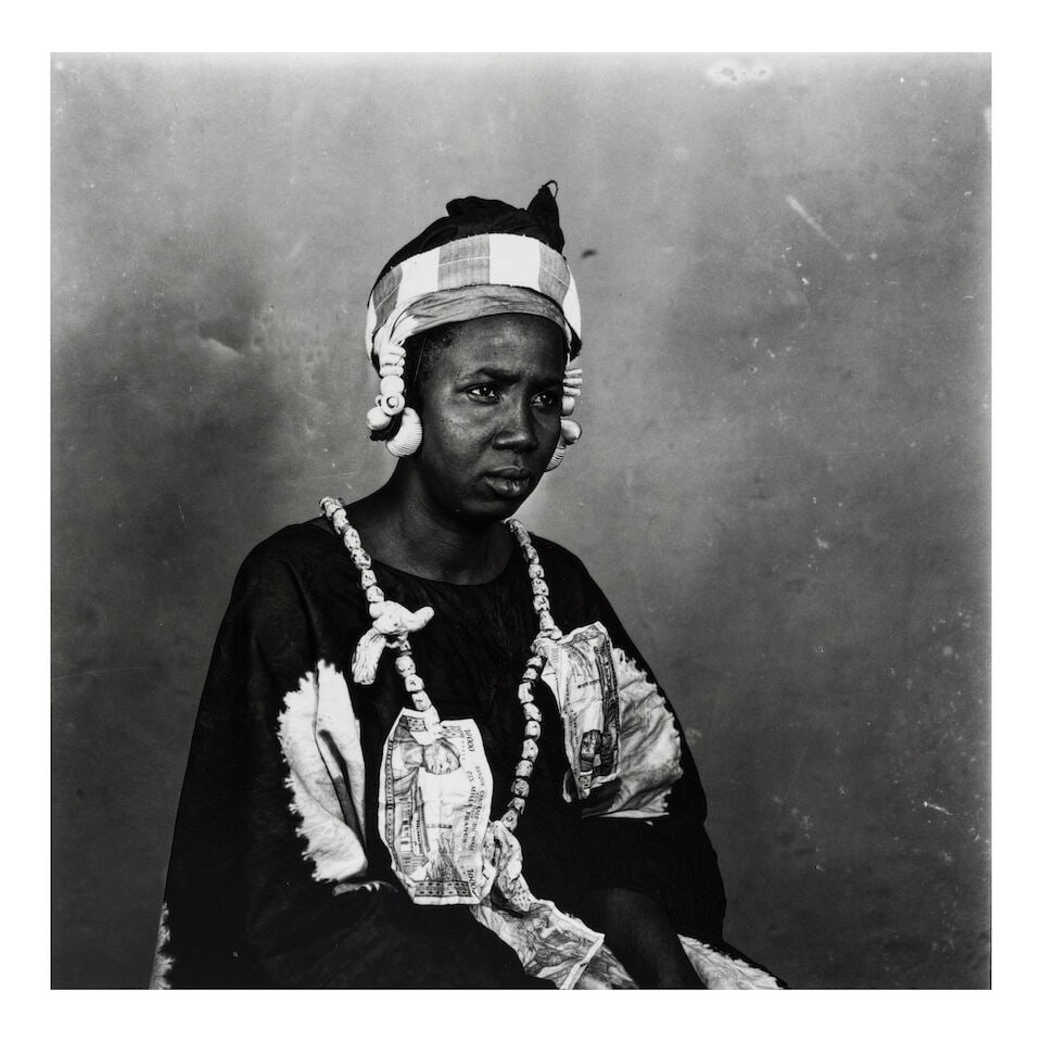 Malick Sidibé (1935-2016); 'Avec billets au mariage de Drissa';: Malick Sidibé (1935-2016) 'Avec billets au mariage de Drissa', 1967 Gelatin silver print, printed 1999; signed, titled, and dated in ink in the margin. 10 1/2 x 10 1/2 in. (26.7 x 26.7 cm.) sheet