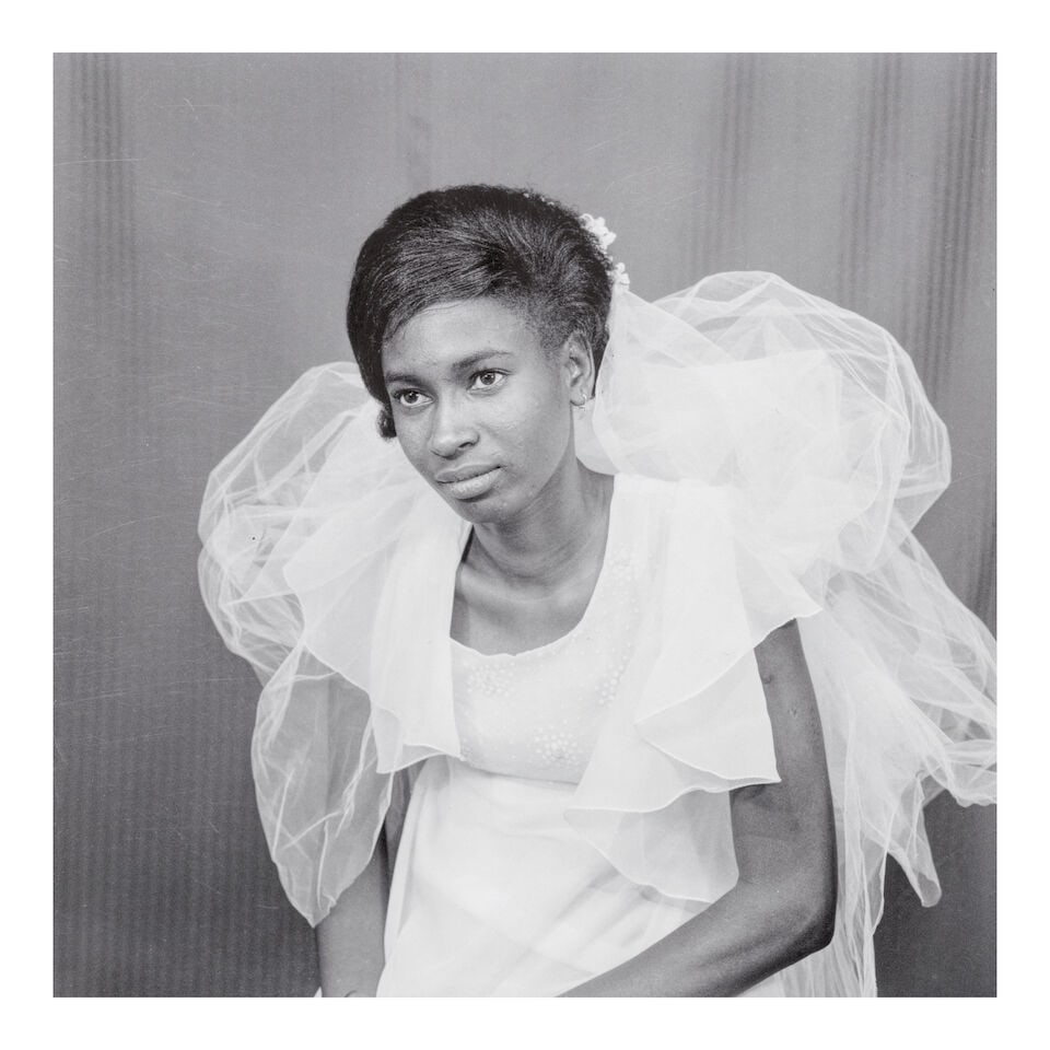 Malick Sidibé (1935-2016); 'La jeune Mariée';: Malick Sidibé (1935-2016) 'La jeune Mariée', 1975 Pigment print, printed 2008; signed, titled, and dated in ink in the margin. 13 7/8 x 13 7/8 in. (35.2 x 35.2 cm.) sheet 19 3/4 x 15 7/8 in.