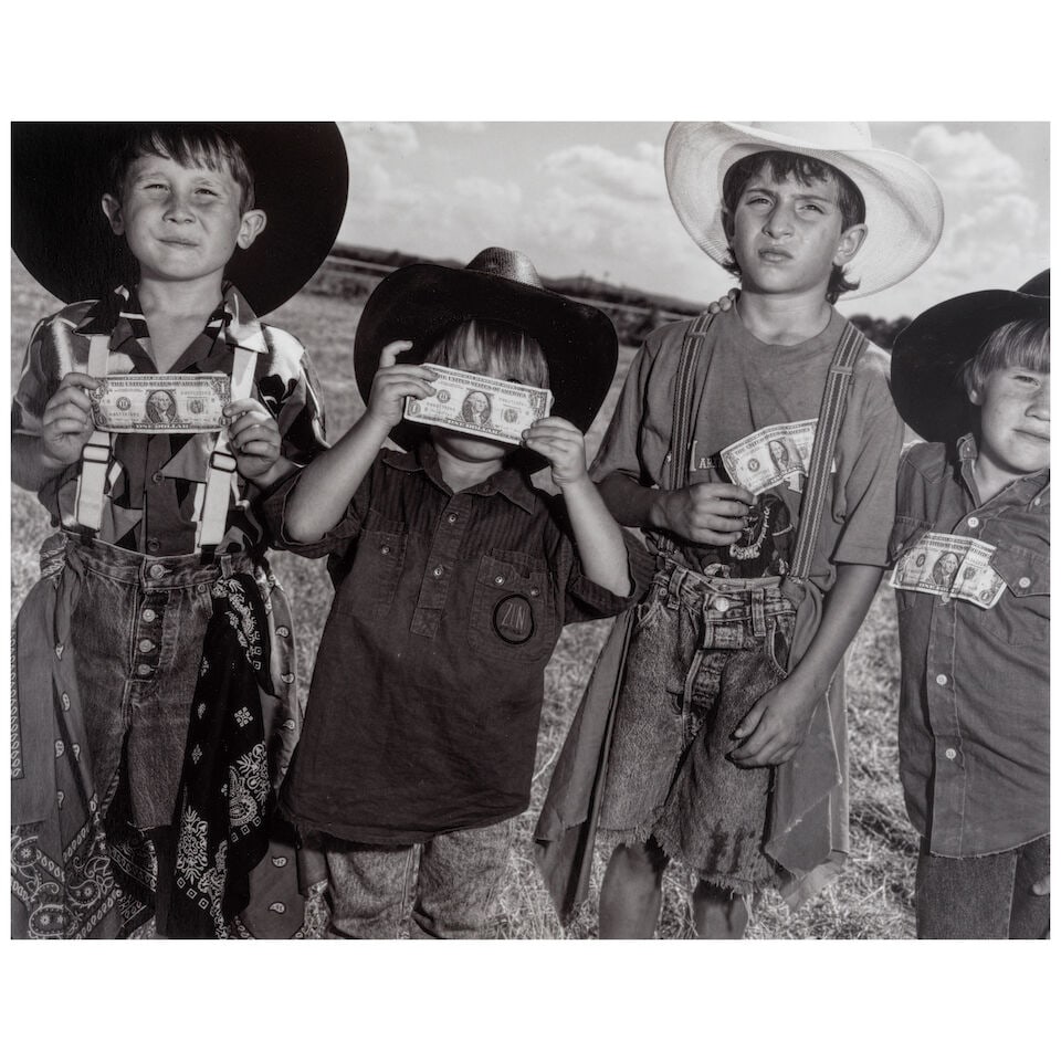 Mary Ellen Mark (1940-2015); 'Boys with Dollars, Boerne, Texas' (Young Bull Riders);: Mary Ellen Mark (1940-2015) 'Boys with Dollars, Boerne, Texas' (Young Bull Riders), 1991 Gelatin silver print, printed later; signed, titled, dated, and editioned '35/100' in pencil on the reverse. 9 