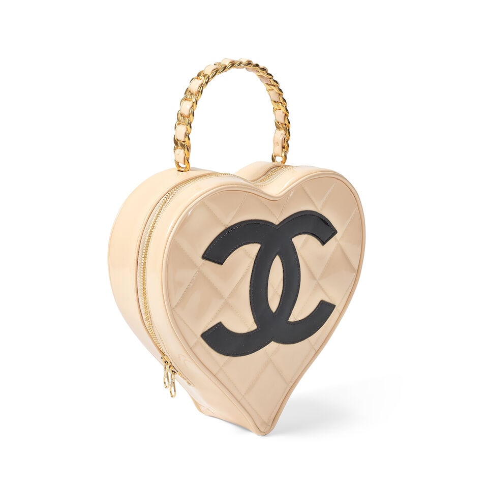Chanel: a Beige Patent Leather Heart Vanity Bag 'Barbie' Collection Spring 1995 (includes serial... - 2