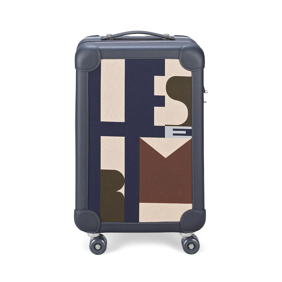 Hermès: a Bleu Indigo R.M.S Cabin Suitcase (includes toile suitcase cover, original packagi...: Hermès: a Bleu Indigo R.M.S Cabin Suitcase 'Hermès Pacific' printed H Plume canvas with Taurillon Regate leather in Bleu Indigo/Ecru/Beige/Bleu Nuit colourway, silver tone hardware Condition