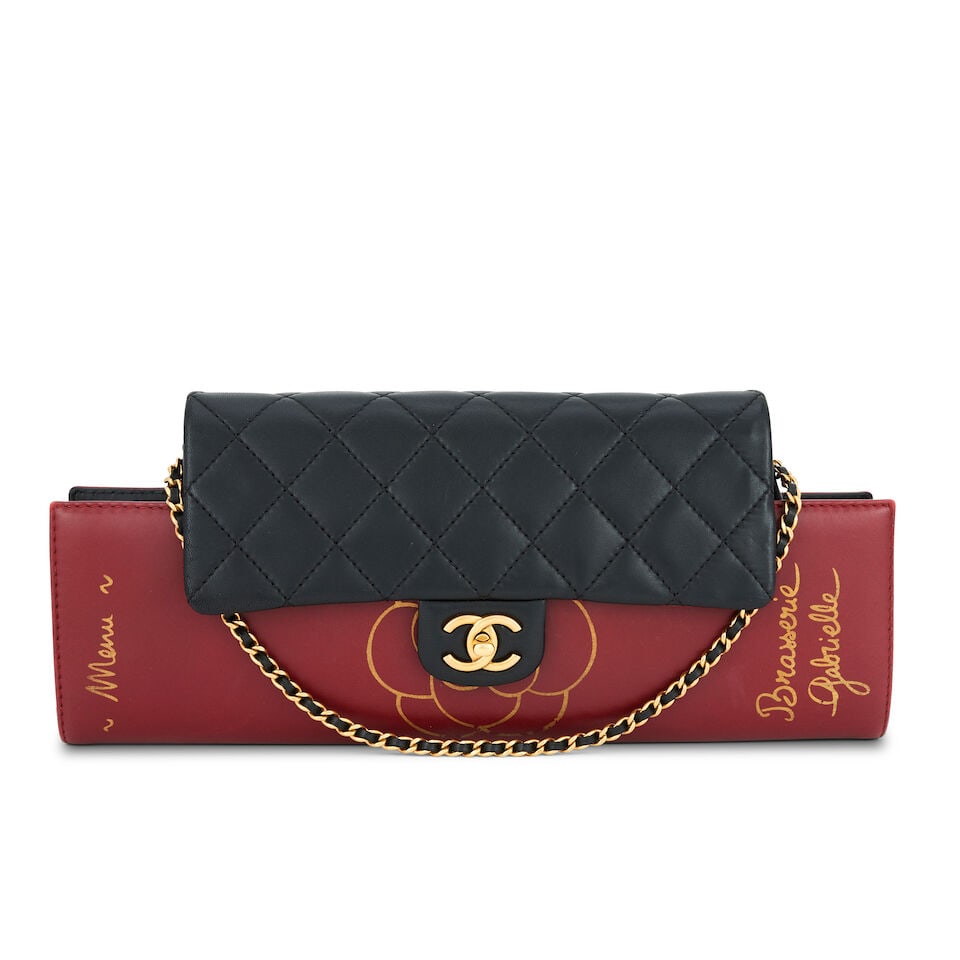Chanel: a 'Brasserie Gabrielle' Menu Clutch Bag Autumn/Winter 2015 (includes serial sticker, du...: Chanel: a 'Brasserie Gabrielle' Menu Clutch Bag Autumn/Winter 2015 Creative Director: Karl Lagerfeld Burgundy smooth leather designed to look like a folded menu with quilted black lambskin flap, brush