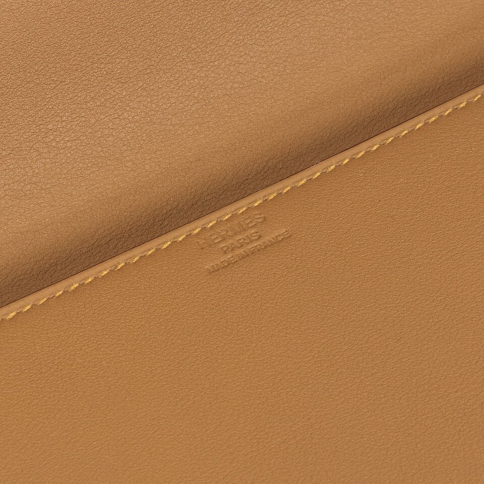 Hermès: a Bronze Doré Swift Leather Shadow Birkin Pochette 2023 (includes felt protect... - 2